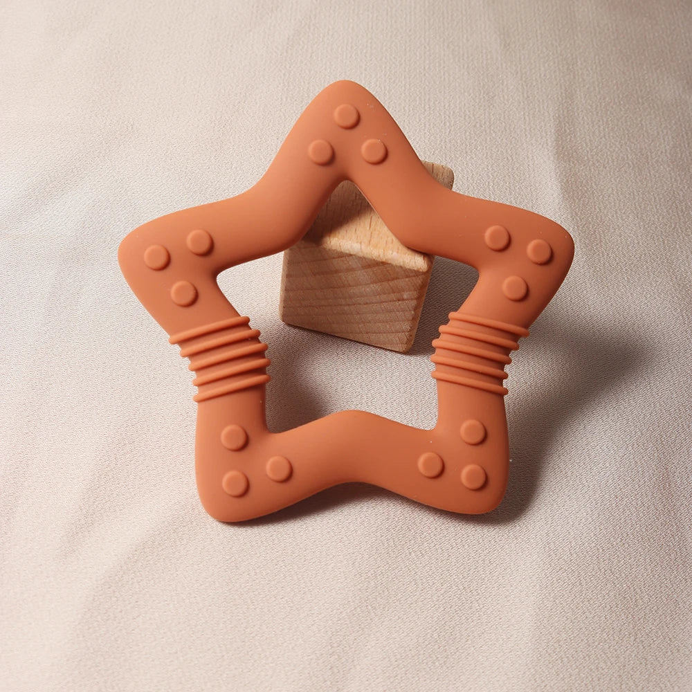 Nuevo 2024 estrella mordedor de silicona Grado alimenticio juguete para la dentición de bebé en forma de corazón.