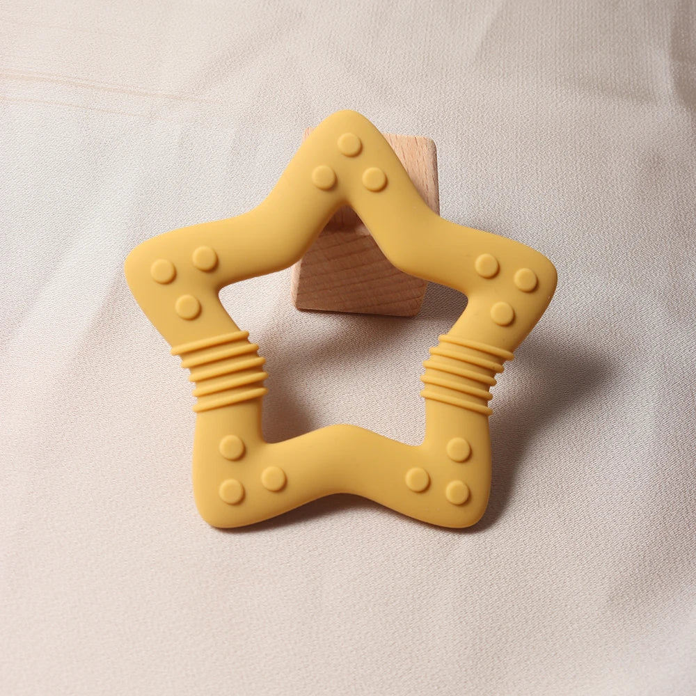 Nuevo 2024 estrella mordedor de silicona Grado alimenticio juguete para la dentición de bebé en forma de corazón.