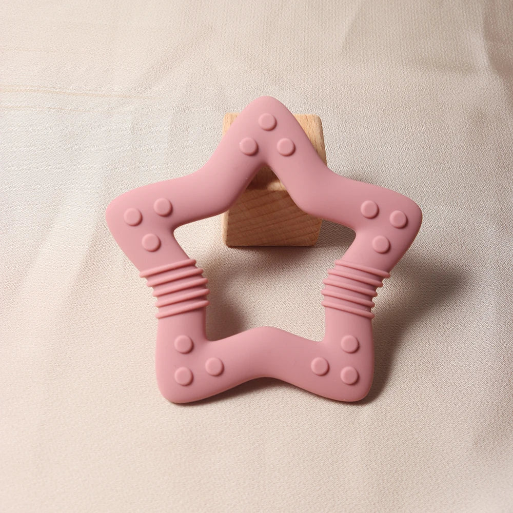 Nuevo 2024 estrella mordedor de silicona Grado alimenticio juguete para la dentición de bebé en forma de corazón.
