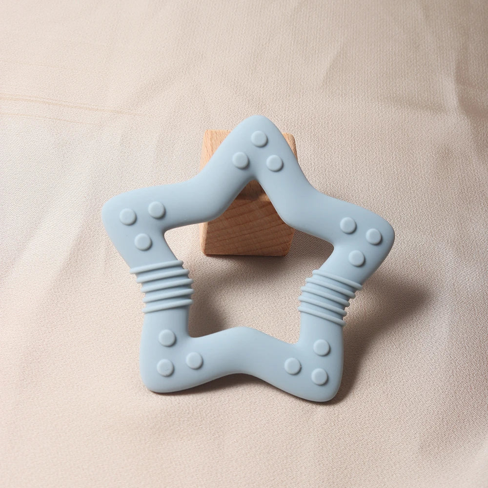 Nuevo 2024 estrella mordedor de silicona Grado alimenticio juguete para la dentición de bebé en forma de corazón.